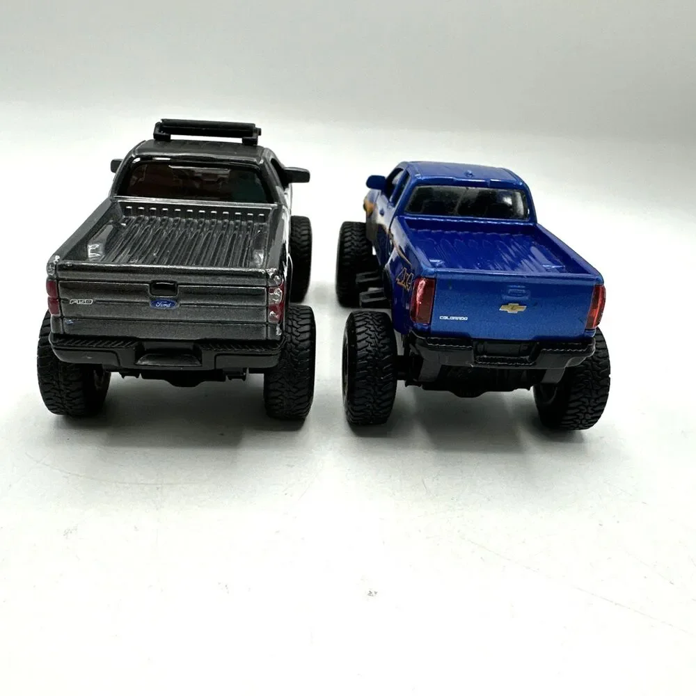 Lot of 2 Maisto 4x4 Ford F150 XL Pickup SEVERE OFF ROAD & Chevrolet 4x4 Pickup